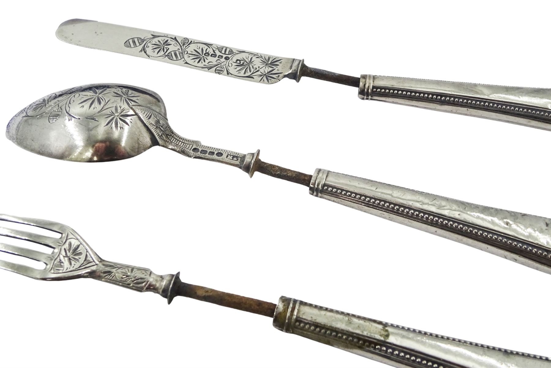 1920's silver christening mug, of plain form with engraved monogram and date to body and scroll handle, upon a circular stepped foot, hallmarked Walker & Hall, Birmingham 1925, H8.5cm, together with a Victorian silver three piece christening set, comprising knife, fork and spoon with beaded edge, hallmarked London, probably 1865, makers mark indistinct, contained within a fitted case with blue silk and velvet lined interior, approximate total silver weight 6.26 ozt (195 grams)