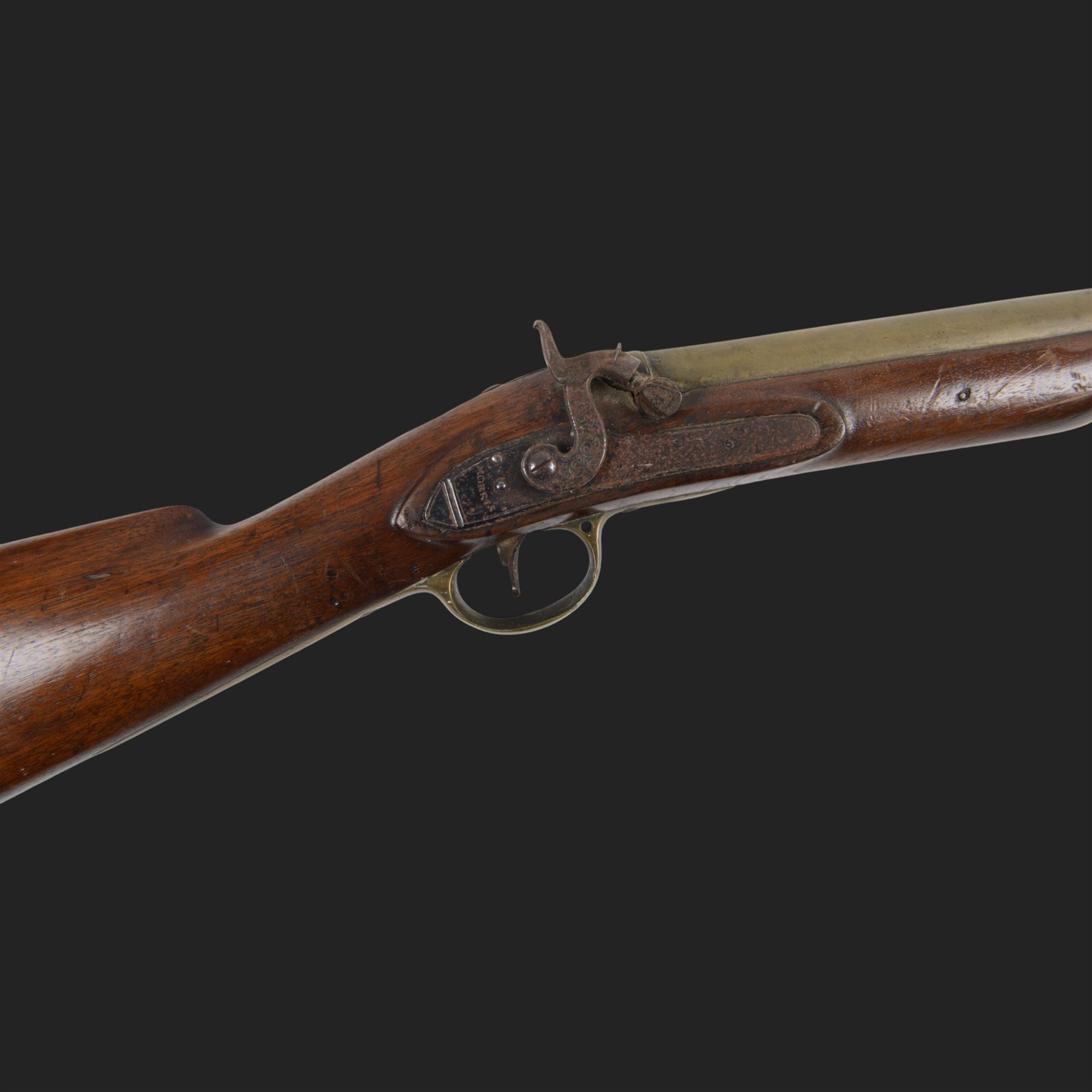 English flintlock blunderbuss, the 38cm brass barrel with proof marks and London to the top, with brass tip ramrod below, the lock engraved Morris, walnut stock with brass butt plate, overall L79cm