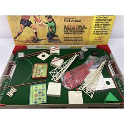 Subbuteo - three boxed sets comprising Football Express with two five-a-side teams and floodlighting; Continental with four teams and accessories; and International Edition Table Rugby with two teams; together with a Real Madrid 1974-75 League Champions pennant (4)