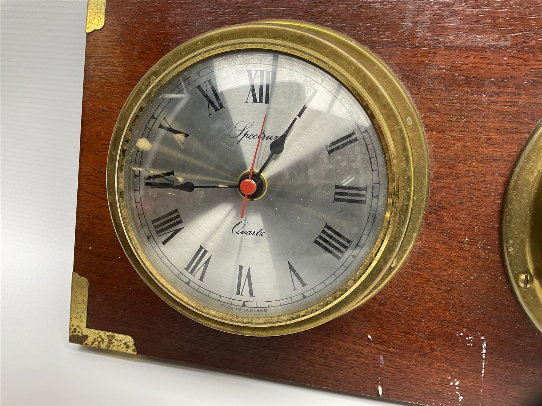 Wall hanging Spectrum quartz clock and Weathermaster barometer, together with six turned spokes ship wheel with brass central boss, D48cm