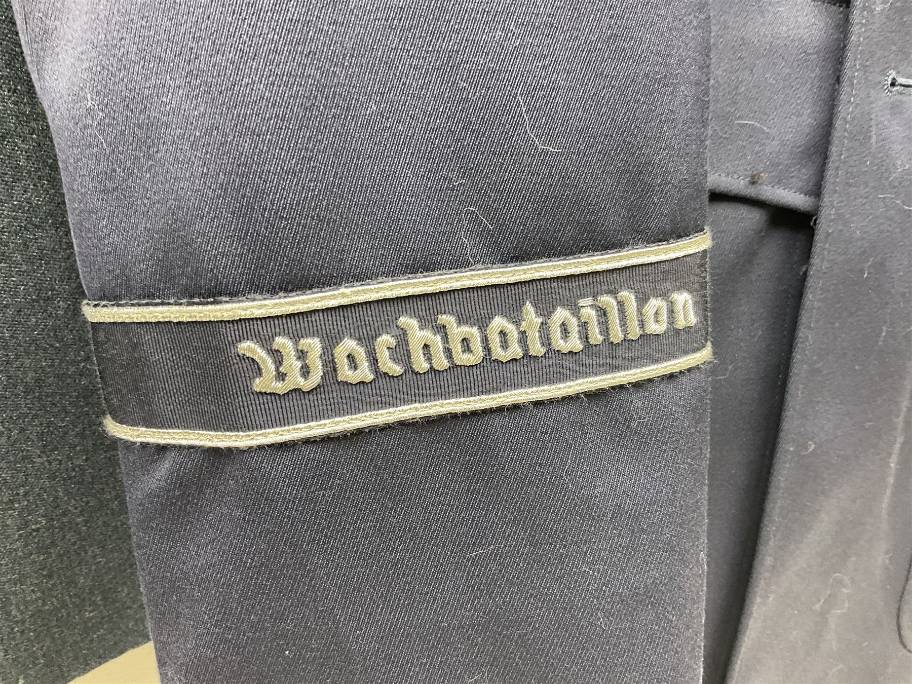 Five military uniforms comprising German Wachbataillon tunic, RASC No.2 dress tunic dated 1963, RAF tunic and trousers dated 1974, RE No.1 tunic and RN Seamans jumper Class II (5)