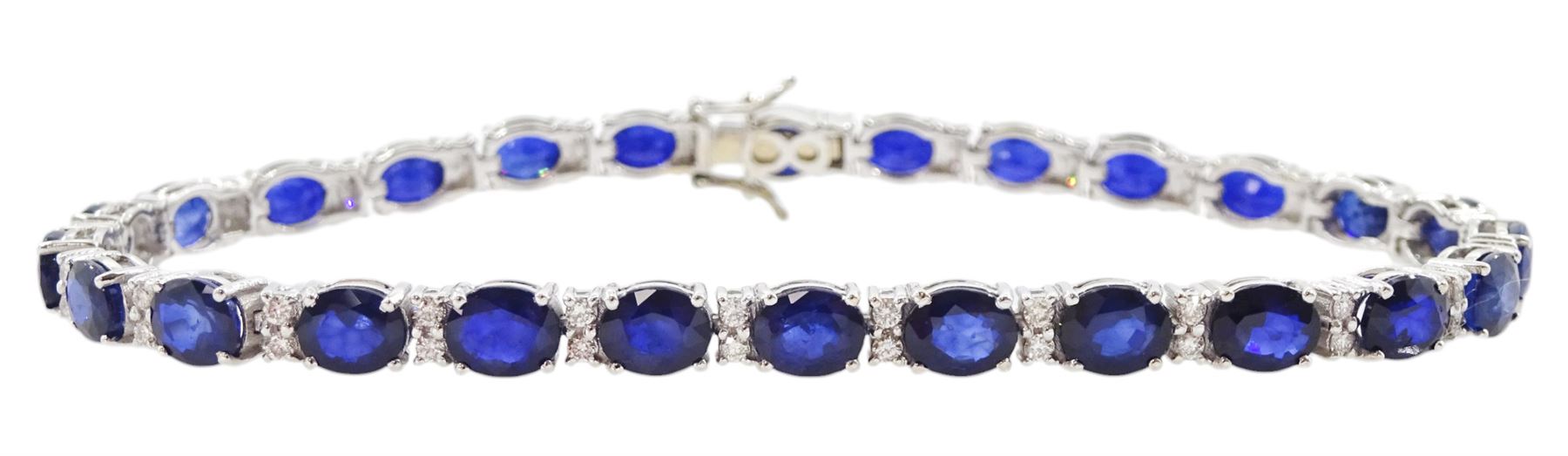 18ct white gold oval cut sapphire and round brilliant cut diamond bracelet, stamped 750, total sapphire weight 11.70 carat, total diamond weight 0.48 carat