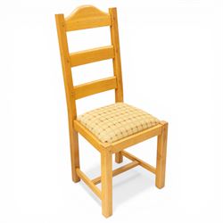 Late 20th century set of four light oak dining chairs, with green and red upholstery, on square supports united by H-stretcher 