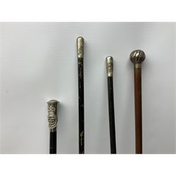 Collection of walking sticks and canes to include 19th/ early 20th century vertebrae example with whale tooth grip, Victorian and later hallmarked silver handled examples, swagger sticks etc 