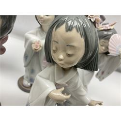 Six Lladro figures of the China doll set and Oriental doll set, comprising Playing the Flute no.6150, Bearing Flowers no.6151, Flower Gazer no. 6152, Oriental Dance no. 6230, Oriental Lantern no. 6231 and Oriental Beauty no. 6232, largest H20cm