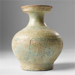 Green glazed 'Hu' jar, probably Han Dynasty, with flared rim H15.5cm 