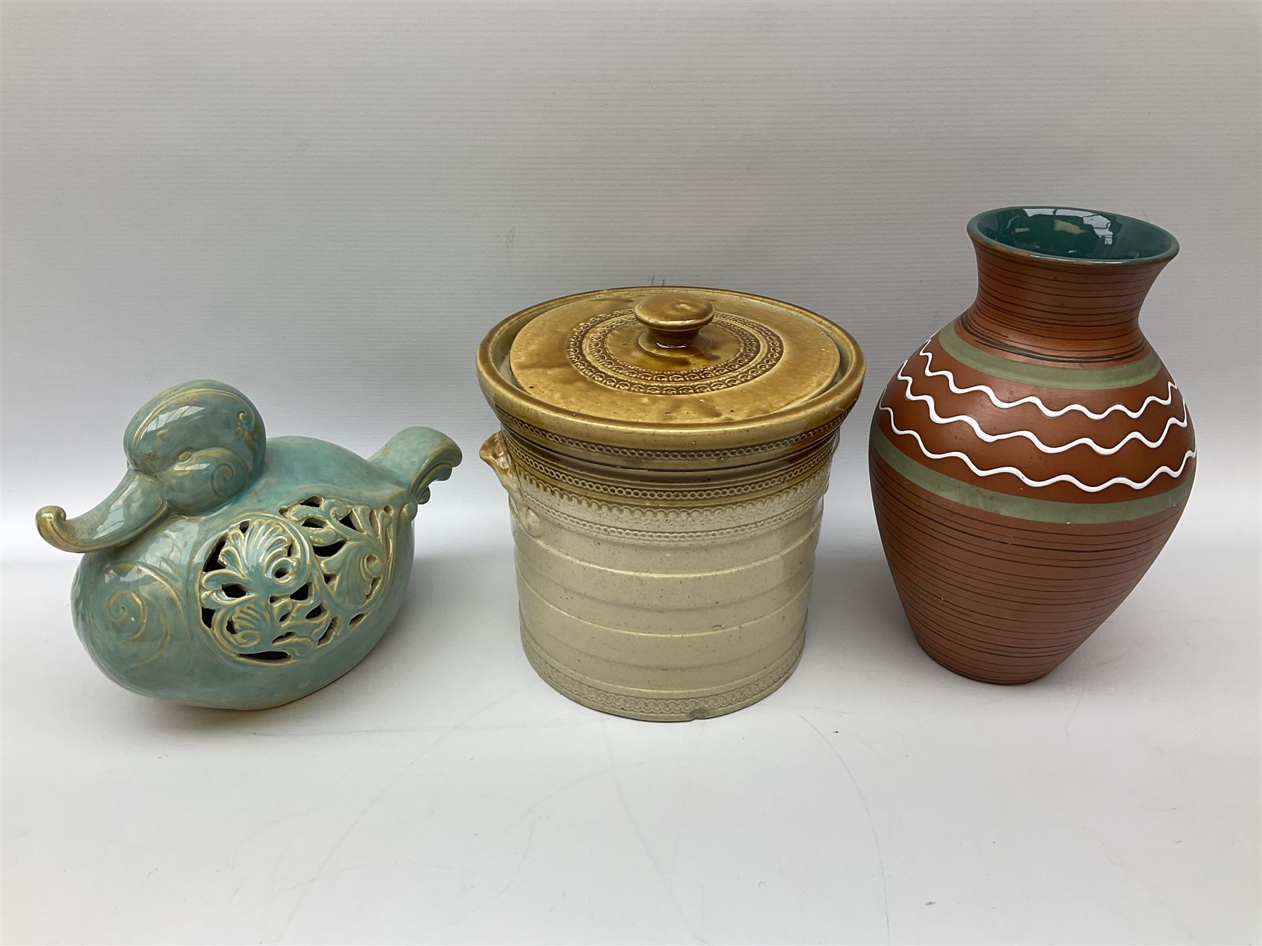 Quantity of studio pottery to include square section vase decorated with blossoming branches, other studio pottery to include jugs, bowls, vases etc, with various marks, duck egg b,J.E. bowl stamped Buchan, continental pottery, other stoneware pottery to include glazed jar with lid etc