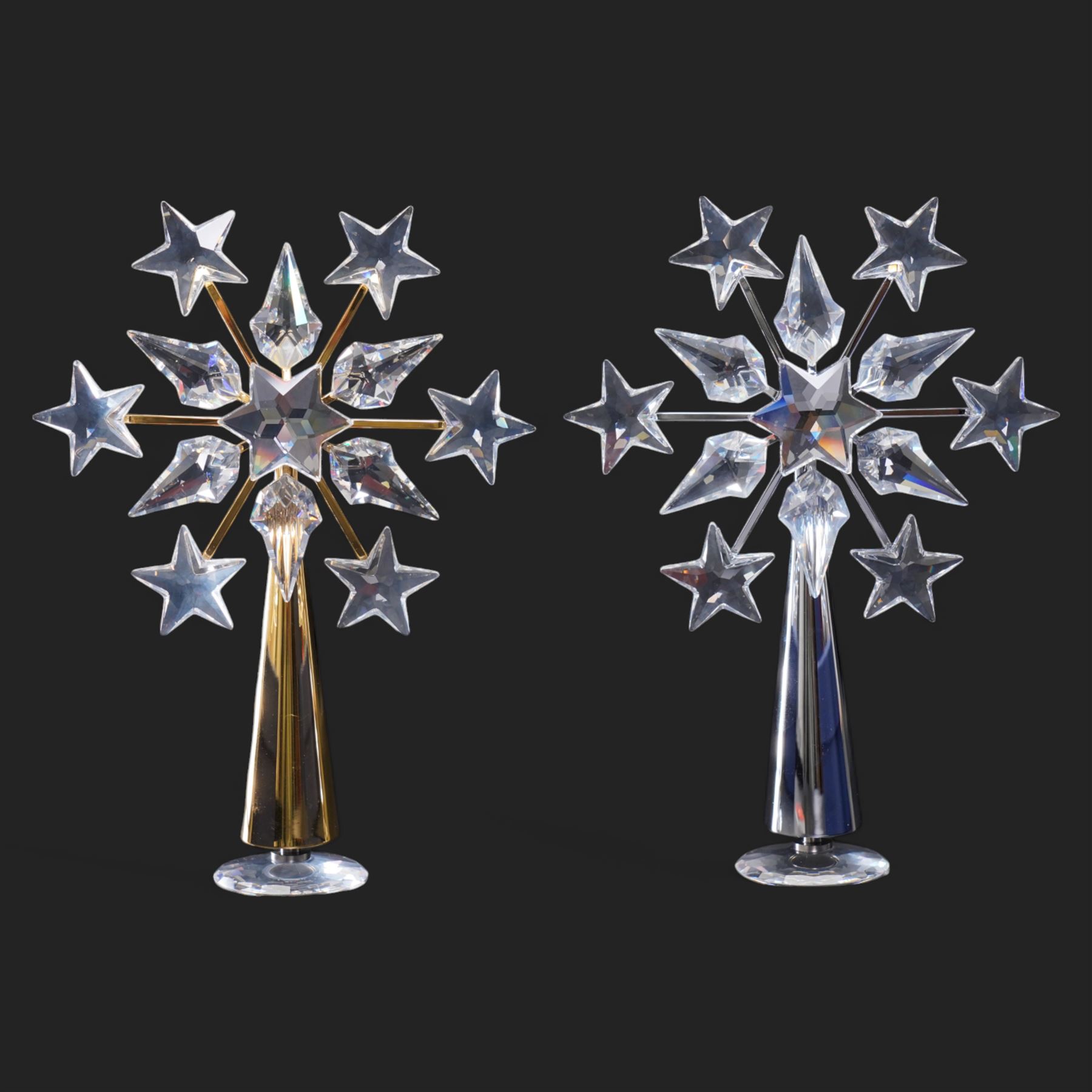 Two Swarovski crystal tree toppers, in gold and silver finishes, boxed (2)