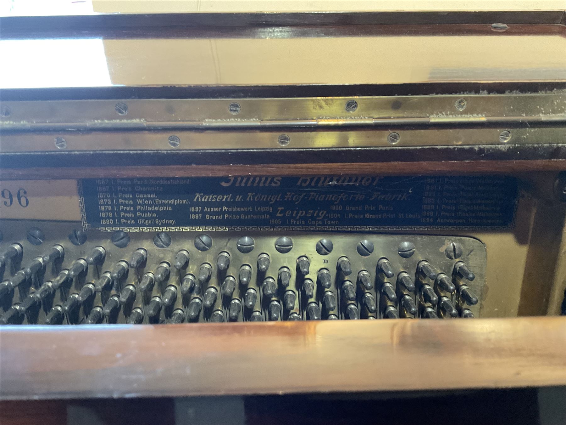 Bluthner of Leipzig - Early 20th century overstrung upright piano, serial number 79496 (1910), in a mahogany case with three front case panels and folding music desk, with 85 keys (seven octaves) underdamper action, original hammers, stringing, tuning pins, dampers and felts, with sostenuto and sustain pedals. Julius Bluthner was considered to be one of the the best makers of German upright pianos in the early 20th century both for tone quality and build. 

This item has been registered for sale under Section 10 of the APHA Ivory Act.