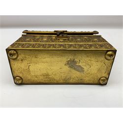 19th century brass repoussé perfume box, the ornately decorated casket with hinged domed cover lifting to reveal gold velvet lined interior containing three glass scent bottles, H14cm W15cm D7cm
