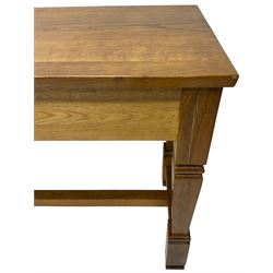 Solid oak console table, rectangular top raised on turned square supports united by stretcher