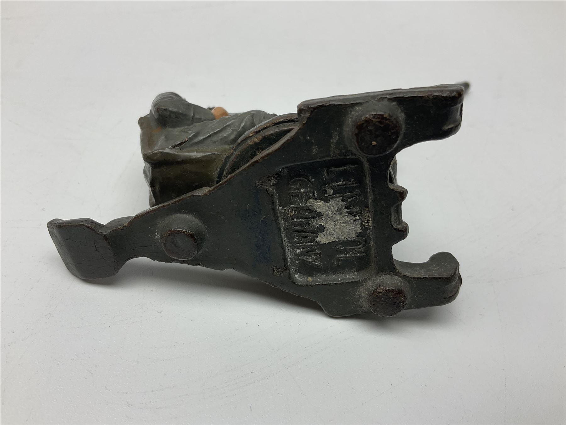 German Lineol Flak Artillery Gun on revolving base H11cm; four other Lineol WW2 German soldiers; and three Elastolin German soldiers including reclining radio operator (8)