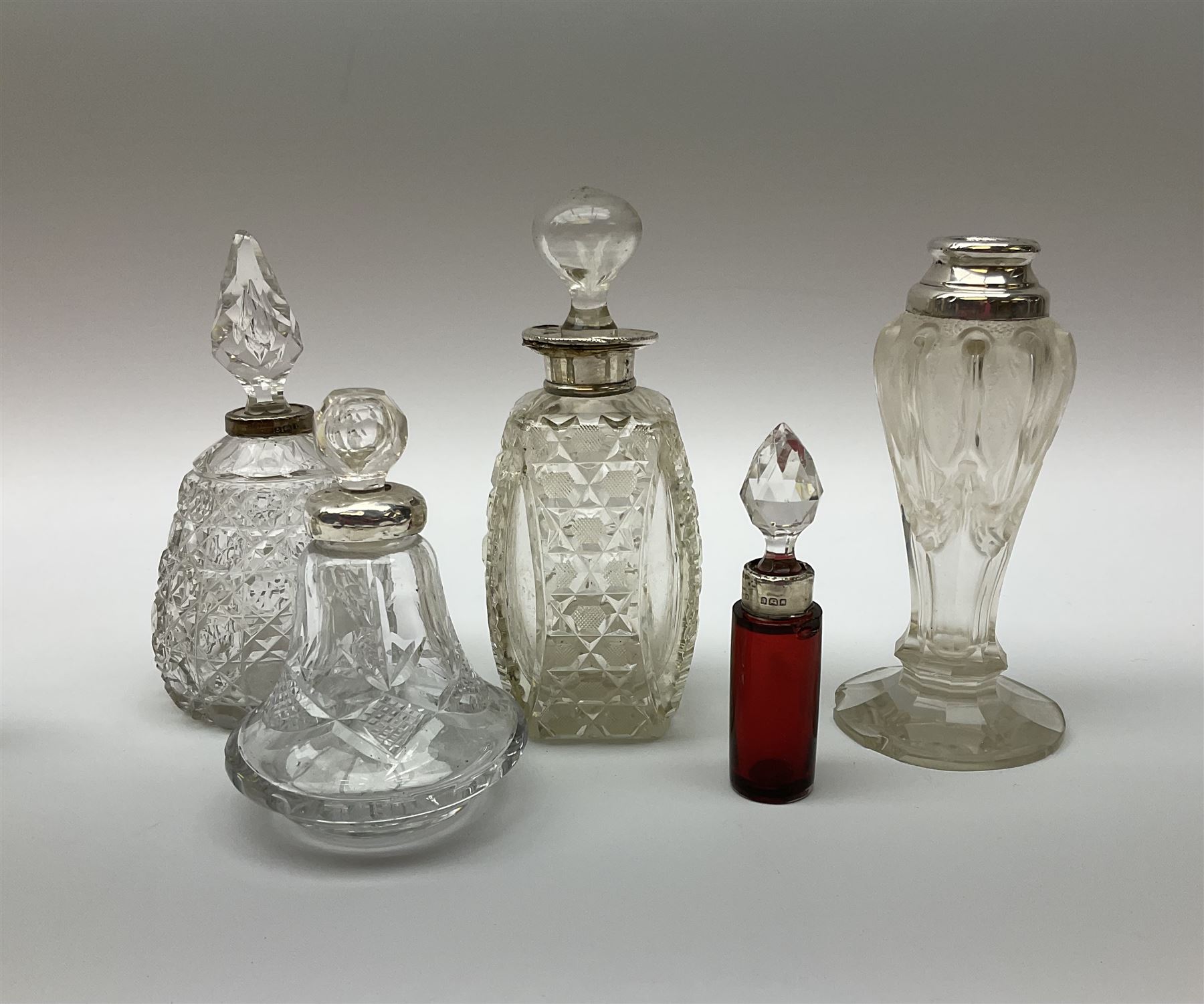 Group of silver mounted glass scent bottles and crested ware, together with a Brierglass lead crystal box with a glass and silver, lid, etc all silver with various hallmarks. 