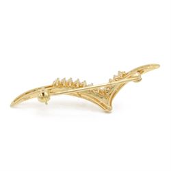 18ct gold diamond wishbone brooch, set with twelve round brilliant cut diamonds, stamped 750, boxed