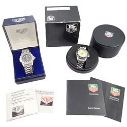 Tag Heuer gentleman's stainless steel automatic wristwatch, Ref. 669.206F, black dial with luminous hour markers, on original stainless steel bracelet,, with fold-over clasp and one other Tag Heuer Night Diver gentleman's stainless steel quartz wristwatch, cream luminous dial, on original stainless steel bracelet, both boxed