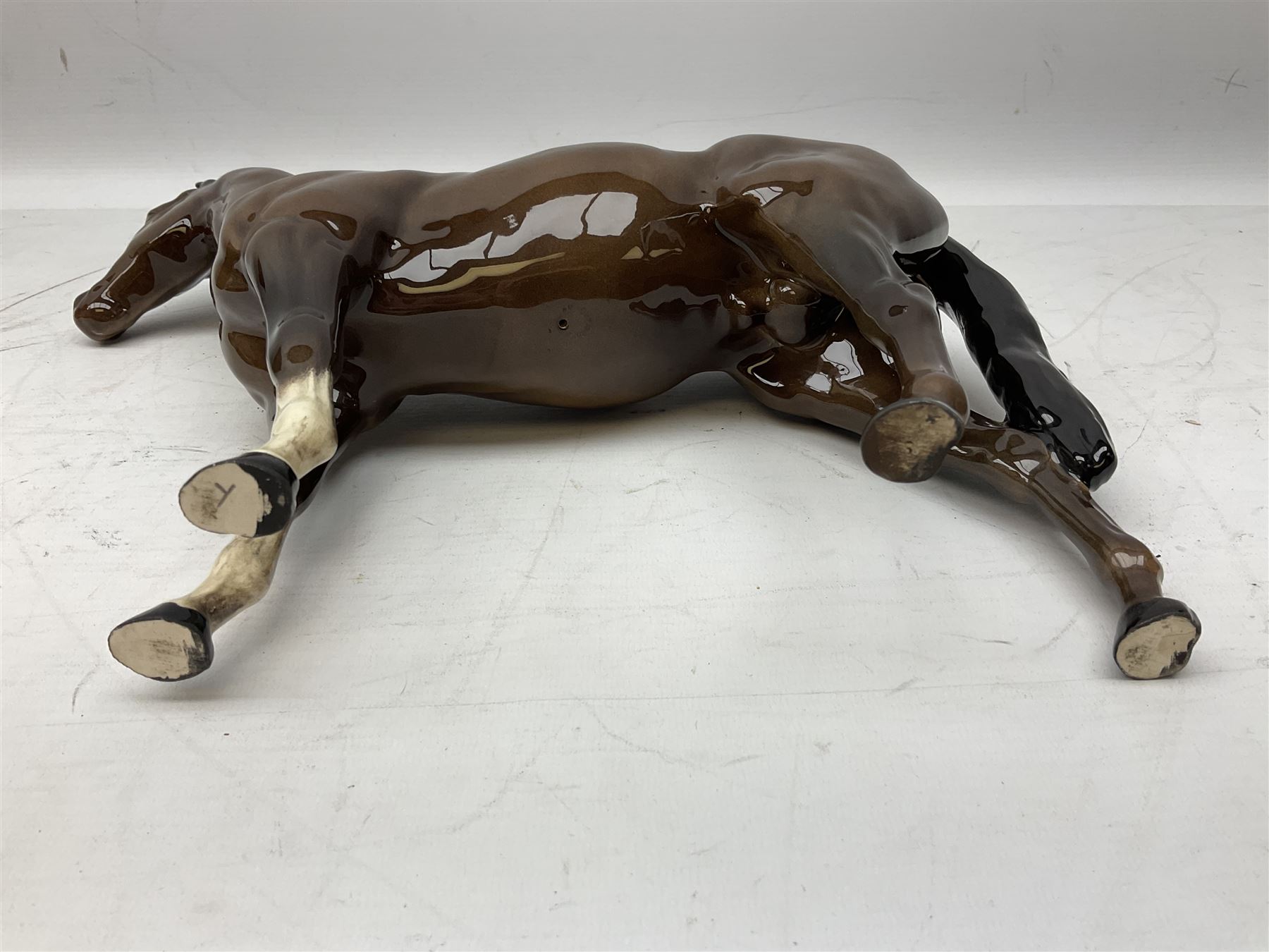 Six Beswick figures of bay horses, including large hunter no.1734, Shire horse no.818, horse with tucked head no.1549, etc (6)