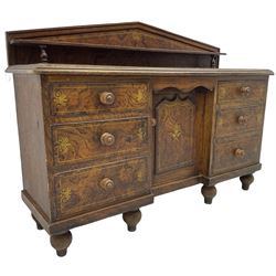 Victorian scumbled pine sideboard, the raised pointed arch back with single shelf, rectangular top with step moulded edge, fitted with six graduating drawers flanking a central recessed cupboard, decorated all-over with painted gilt simulated stringing and fleur-de-lis motifs
