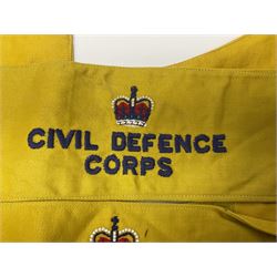 Fourteen Elizabeth II Civil Defence brassards