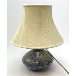 A WMF Ikora style table lamp, the mottled blue and gold coloured body of compressed bulbous form, unmarked, including fabric shade, overall H49cm. 
