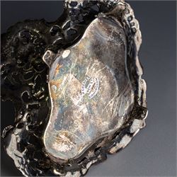 Victorian silver inkwell stand, with silver topped inkwell, hallmarked Lawrence Emanuel, Birmingham 1893, together with a mother of pearl dip pen with silver collar and two silver topped jars, one with guilloche enamel decoration, all hallmarked