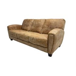 Three seat sofa, upholstered in tan leather