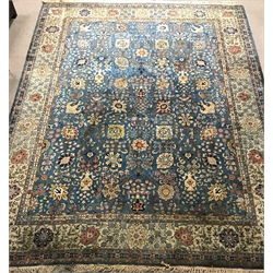  Large Persian style blue ground rug, repeating border, 450cm x 354cm  