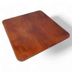 Victorian mahogany tea table, rectangular swivel fold-over top, tapering octagonal column on shaped platform, C-scroll and foliate carved feet with brass castors 