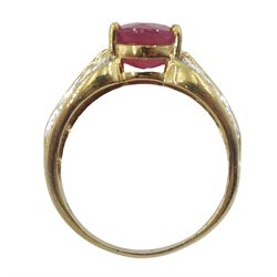 9ct gold oval ruby ring, with channel set, calibre cut ruby and diamond chip shoulders, hallmarked