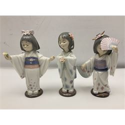 Six Lladro figures of the China doll set and Oriental doll set, comprising Playing the Flute no.6150, Bearing Flowers no.6151, Flower Gazer no. 6152, Oriental Dance no. 6230, Oriental Lantern no. 6231 and Oriental Beauty no. 6232, largest H20cm