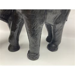 Pair of Liberty style leather bound elephants, with raised trunks, tallest H75cm