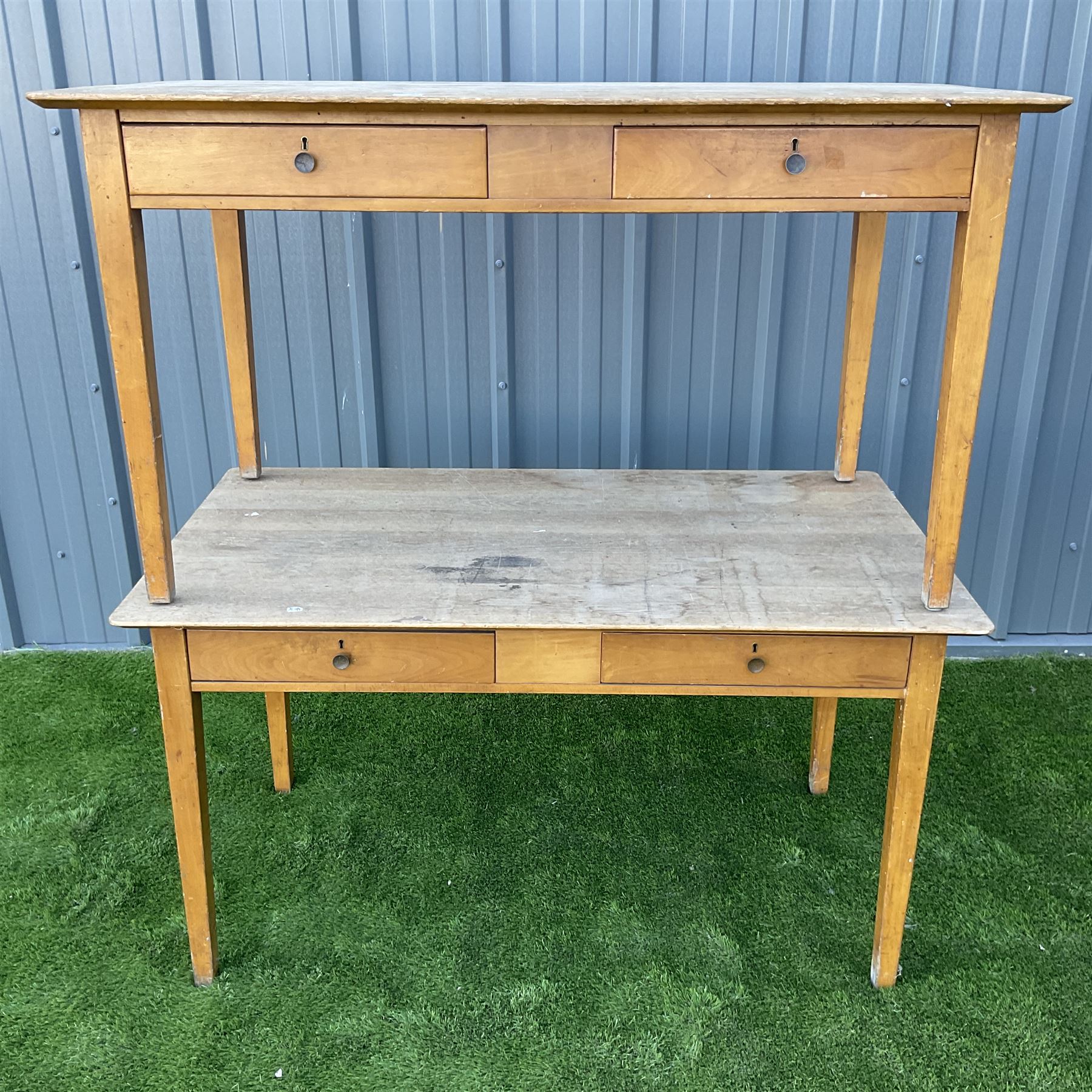 Pair of solid beech wood desks, with two drawers THIS LOT IS TO BE