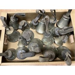 Collection of 44 late 19th century brass church/musical handbells with leather straps by James Shaw Brothers of Bradford and bells marked G.W. possibly cast by the George Welch bell foundry, London.
The number of bells and stated notation, some at different pitch, is as follows;
5 “C”, 4 “D”, 5 “E”, 4 “F”, 5 “G”, 5 “A”, 6 “B”.
3 “F#”, 4 “C#”,1 “Db”, 1 “G#”, 1”A#”.
Two of the bells are minus their clappers and one bell has no leather strap.
