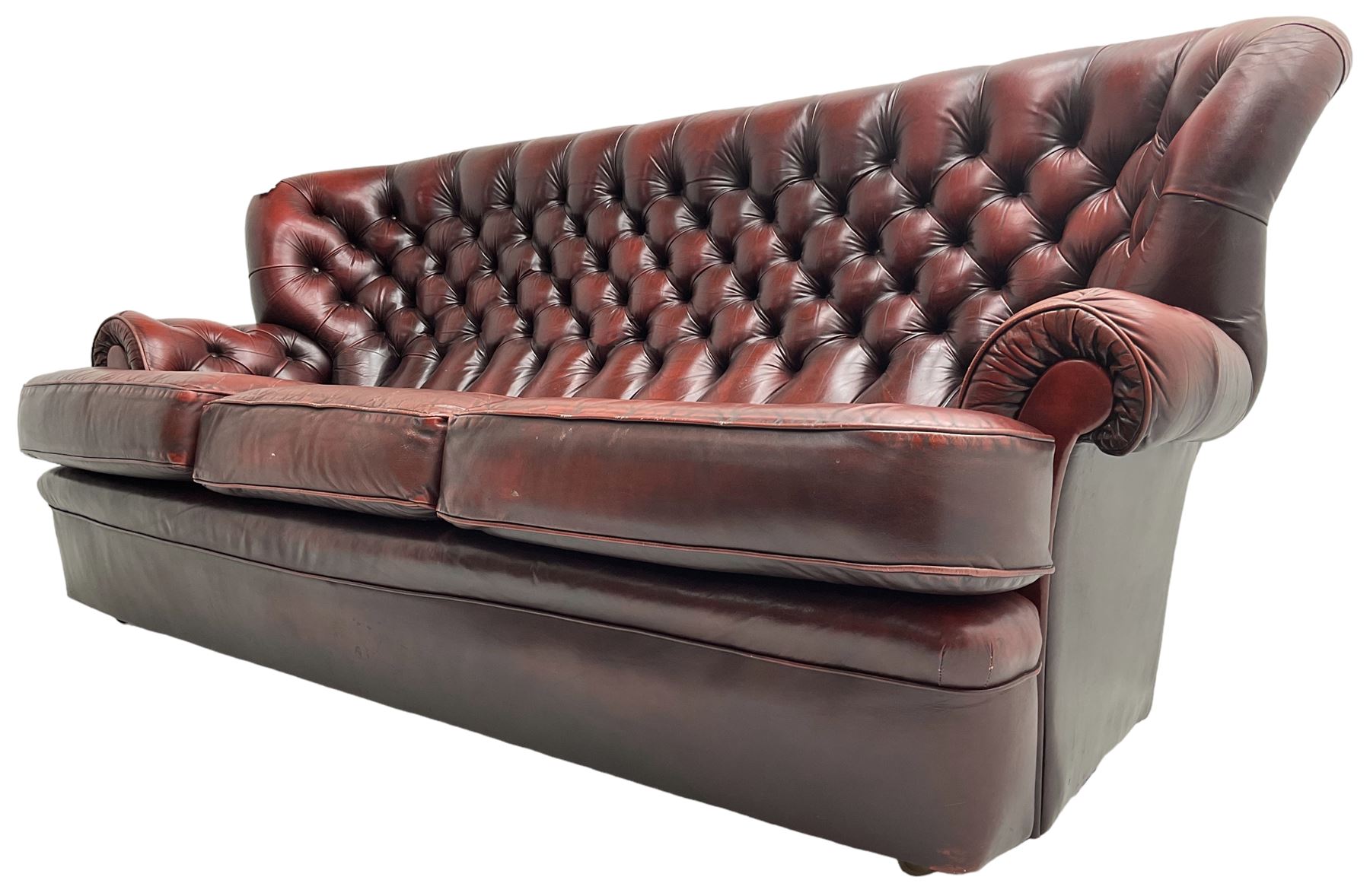Wade - Georgian design three-seat sofa, high curved back over scrolled arms, upholstered in deep buttoned oxblood 'Pegasus' leather, on castors