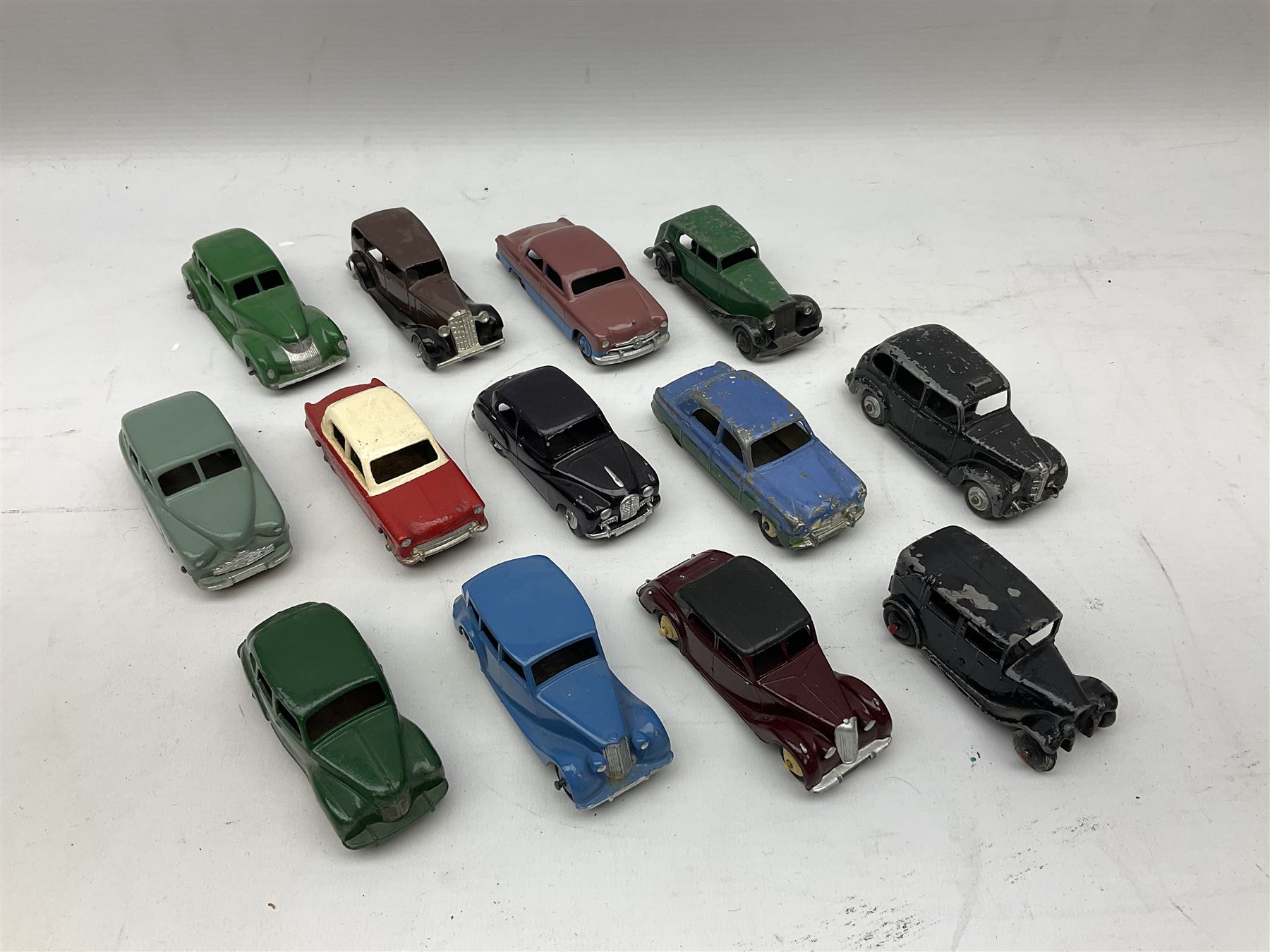 Dinky thirteen unboxed and playworn/repainted early diecast cars