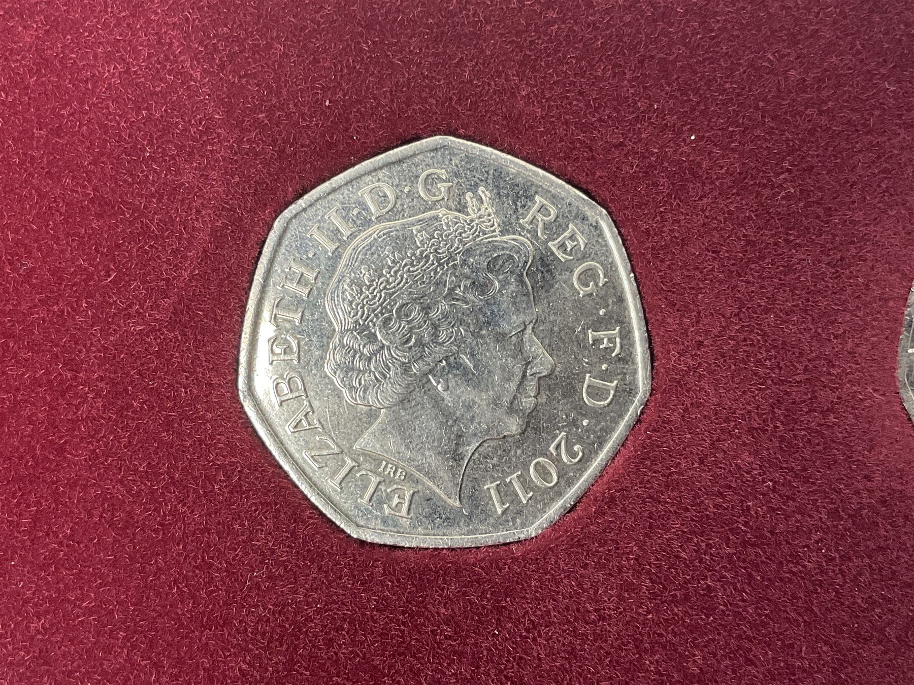 Queen Elizabeth II United Kingdom London 2012 Olympic commemorative fifty pence collection comprising twenty-nine coins and completer medallion, housed in unofficial display case