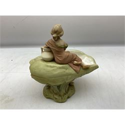 Royal Dux figure modelled as a recumbent woman, upon a conch shell, no. 1750, with applied pink triangle mark to base, H21cm
