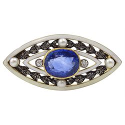 Early 20th century 15ct gold and silver sapphire, pearl, diamond and enamel brooch, the central cushion cut sapphire of approx 4.80 carat, set with an old cut diamond either side, within a white enamel, pearl and diamond laurel leaf surround 