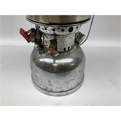 Copper and brass ship’s lamp marked ‘Anchor’, H25cm, Feuer hand storm lantern, Bialaddin Model 315 paraffin lamp and an Anchor lamp (4)