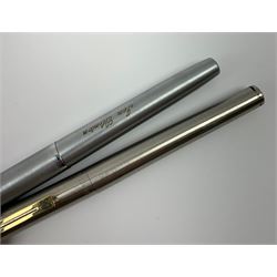 A Sheaffer Triumph Imperial fountain pen, with brushed chrome body, together with another similar brushed chrome example, with nib marked 585 14K, in maker's box. (2). 