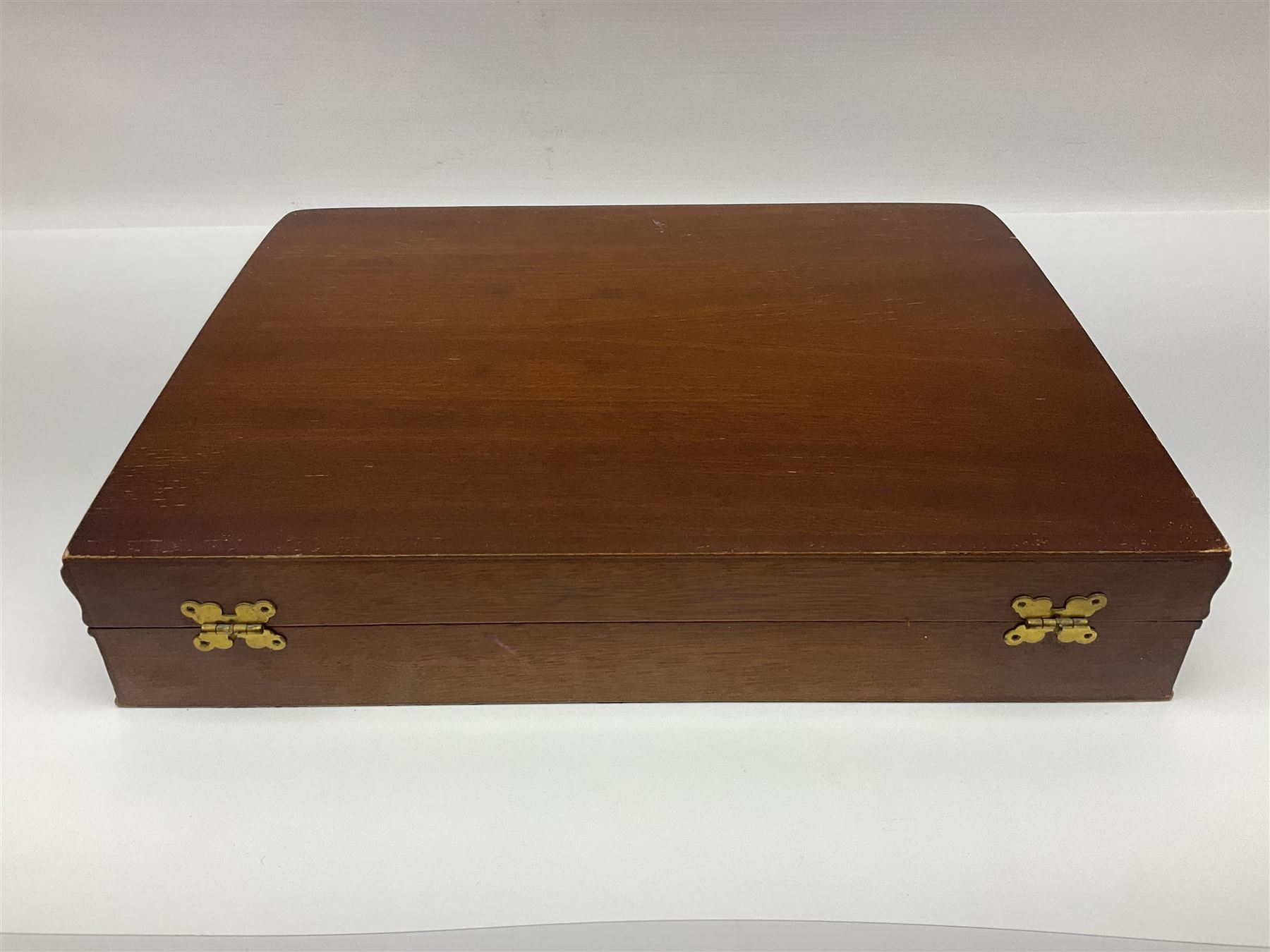 Canteen of King's pattern cutlery for six place settings by James Ryals of Sheffield, with two extra forks, pair of salad servers and six fish knives, all within fitted wooden case, together with six ivorine handled butter knives and six silver plated cake forks