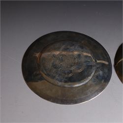Two silver-gilt patens, comprising French silver example, of typical flatted circular form, engraved IHS to underside, with Minerva's head mark to one side and a 1960s example of similar form engraved IHS to underside, hallmarked Pepper & Hope Ltd, Birmingham 1967, largest D12.5cm