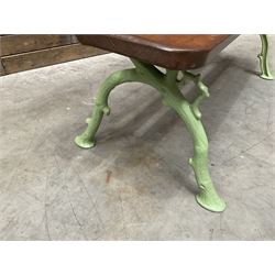Cast iron and wood slate bench painted in green
