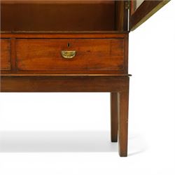 19th century mahogany enclosed bookcase on stand, projecting cornice and banded frieze over two glazed doors enclosing four adjustable shelves, fitted with two drawers to base, on square tapering supports