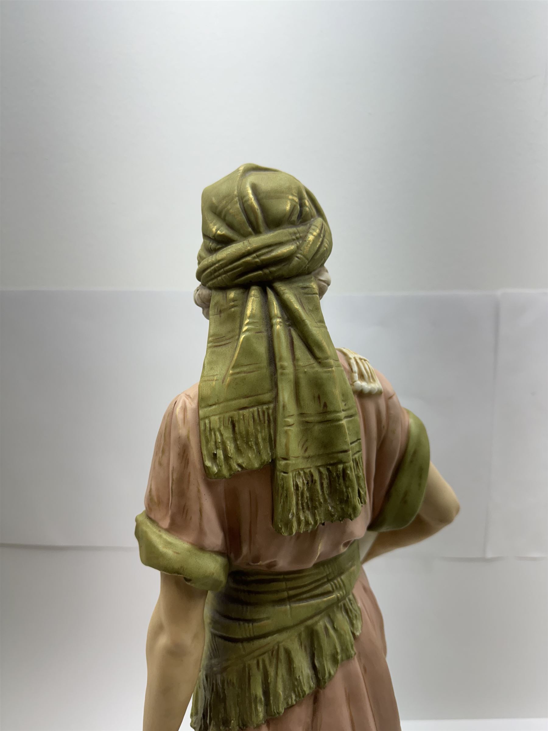 Royal Dux figure no. 686, modelled as a female water carrier, carrying two urns and wearing flowing green and pink robes, with applied pink triangle mark beneath, H61cm