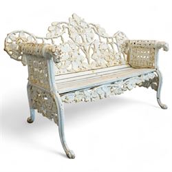 Coalbrookdale design - early 20th century cast iron oak leaf and acorn bench, white painted cast iron frame with slatted wooden seat, the pierced and shaped back decorated with scrolling oak branches and leafage, flanked by dog mask arm terminals over cabriole supports with paw feet 