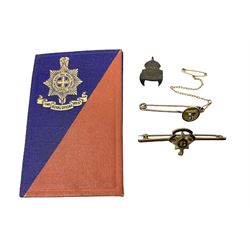 Royal Sussex Regiment 9ct gold sweetheart brooch with Regimental Association membership card to 6406670 Pte. Brock dated 1940; an 18ct gold pin badge enamelled with a shipping company (?) pennant; and an ARP button-hole badge (4)