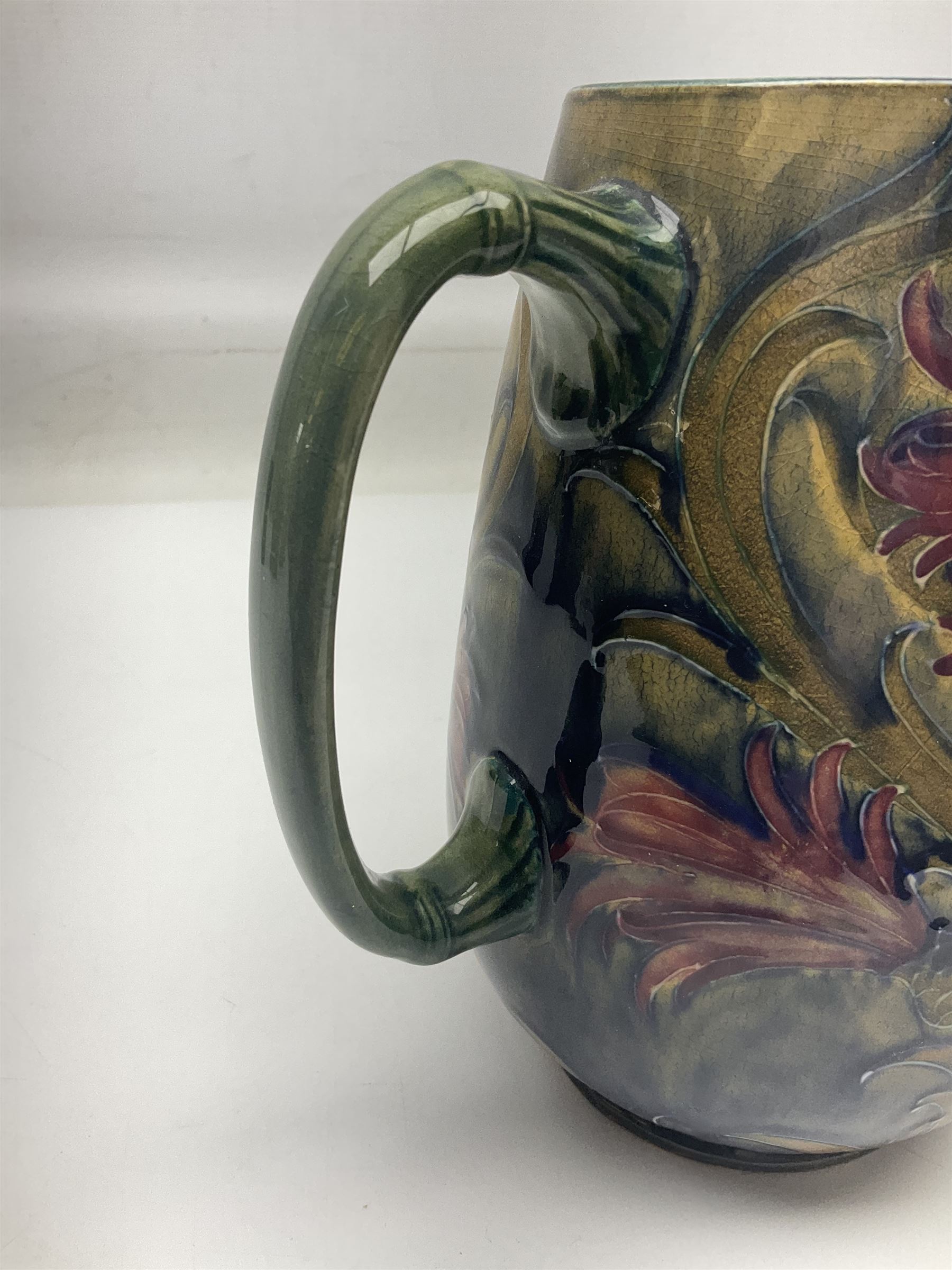 Early 20th century Moorcroft for Macintyre jug, decorated in Revived Cornflower pattern, impressed mark to base, H19cm