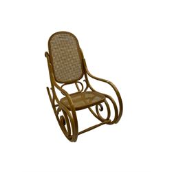 Early to mid-20th century Michael Thonet design bentwood rocking chair, with cane seat and back