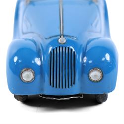 Schuco Akustico 2002 tinplate clockwork car, in blue with red interior, with key, boxed