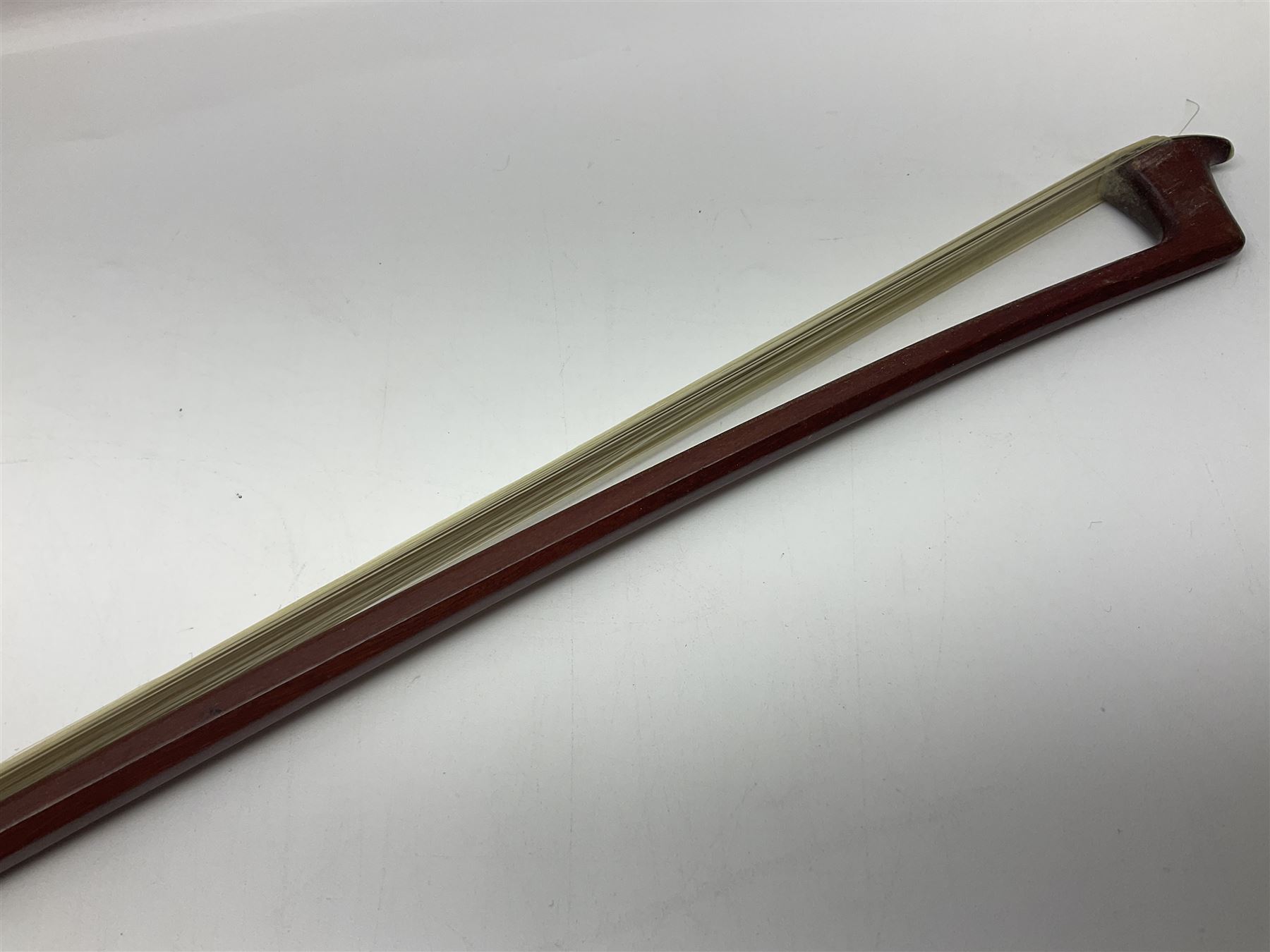 Nickel mounted pernambuco violin bow stamped R. Paesold L73.5cm